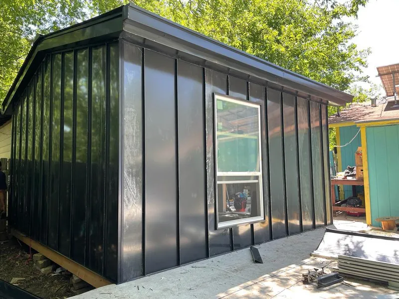 Black standing seam metal wall panels for Roof Inspection in Kearns